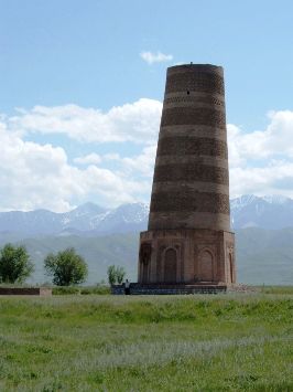 Featured is a photo of the restored Burana Tower about 80 miles from Bishkek, the capital of Kyrgyzstan.  The Tower stands as monument to the ancient city of Balasagun which was founded by the Karakhanids at the end of the 9th century.  There is a fairy tale-like legend attached to the Tower:  a witch warned a local king that his newly-born daughter would die once she reached the age of eighteen. To protect her, he built a tall tower where he sequestered his daughter. No one entered the tower, except the daughter's servant who brought her food. The daughter grew up alone and became a beautiful young lady. One day, however, a poisonous spider was hiding in the food brought by the servant. The spider bit the girl, and she died in the tower, at the age of eighteen.
 
